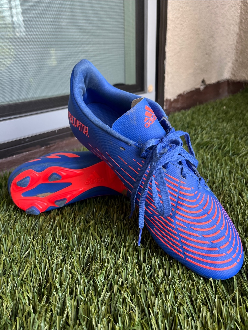 Adidas Predator men’s firm ground cleats US size 8.5 vibrant blue and orange